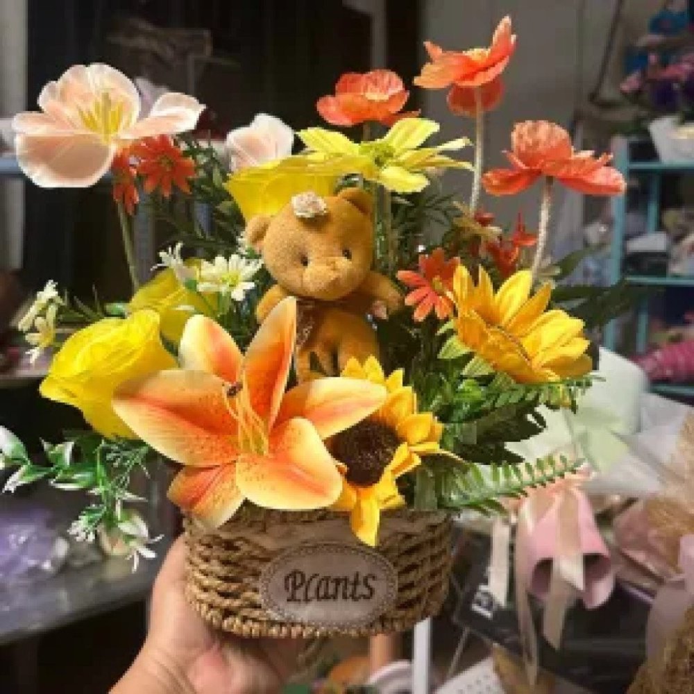 58 artificial flowers in basket