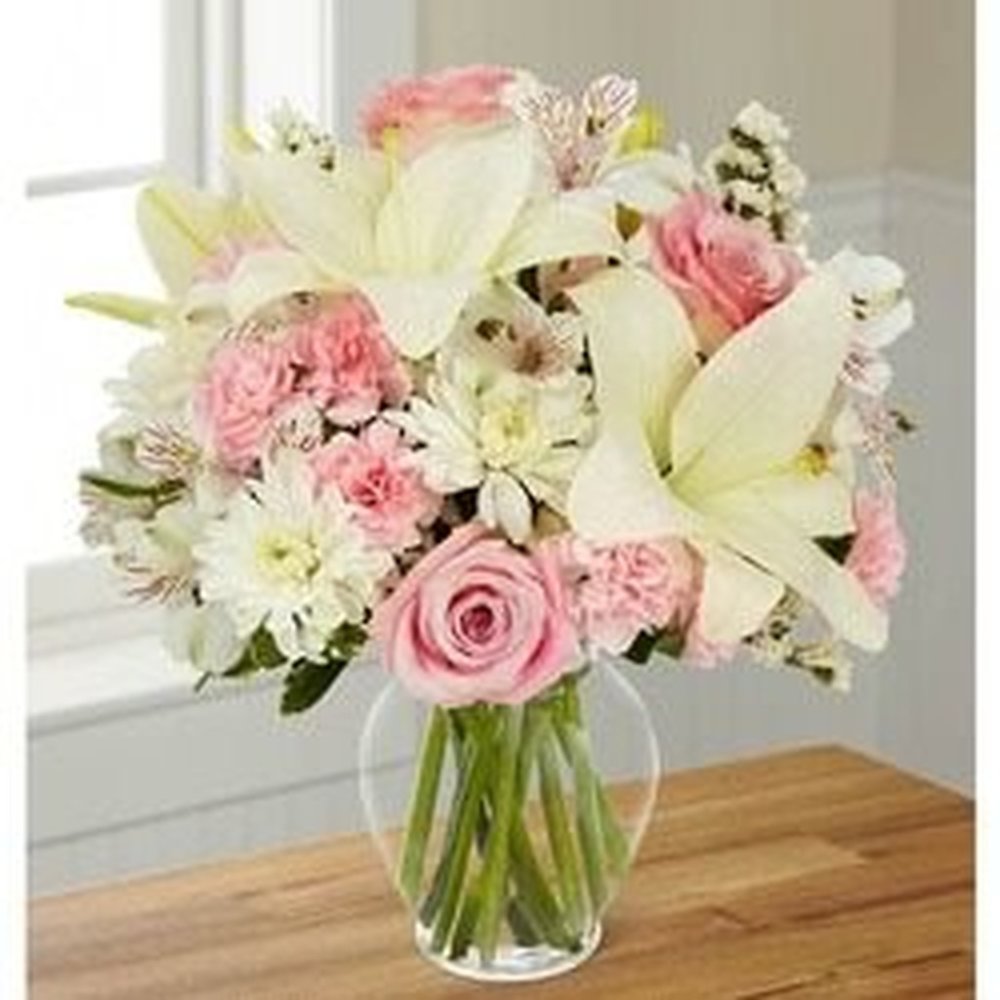 Pink roses lilies glass vase