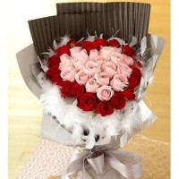 SWEET ROSE AND LILIES WITH CHOCOLATE IN BASKET