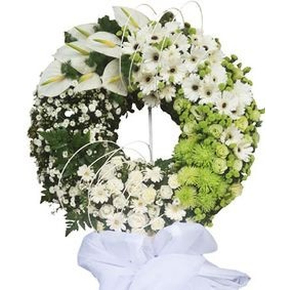 Witte en groene rouwkrans