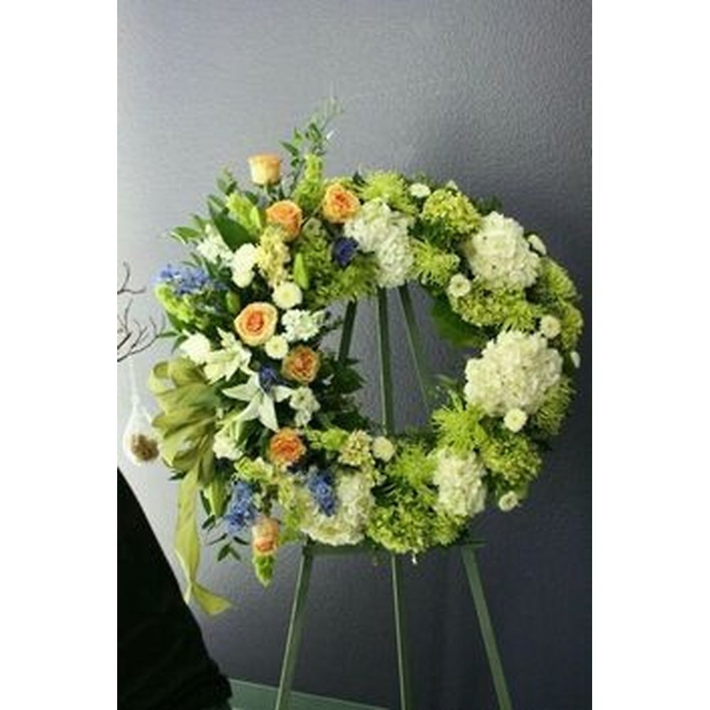 Blomsterkrans på staffli