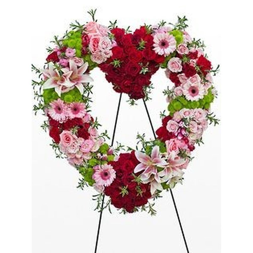 Heart-shaped red pink funeral wreath