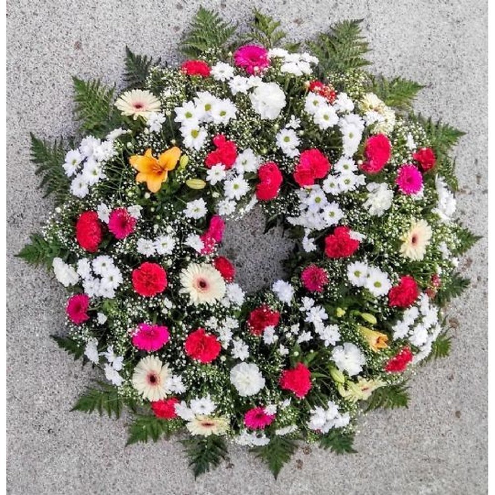 Colorful floral memorial sympathy wreath