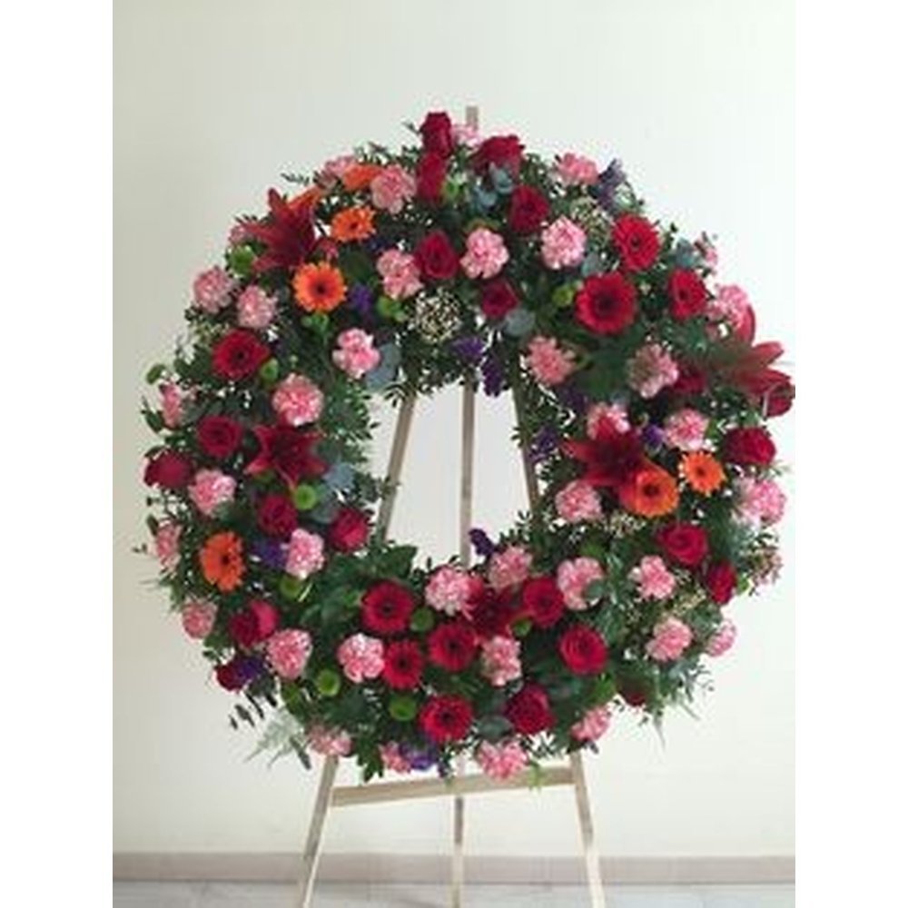 Röd och rosa begravningskrans