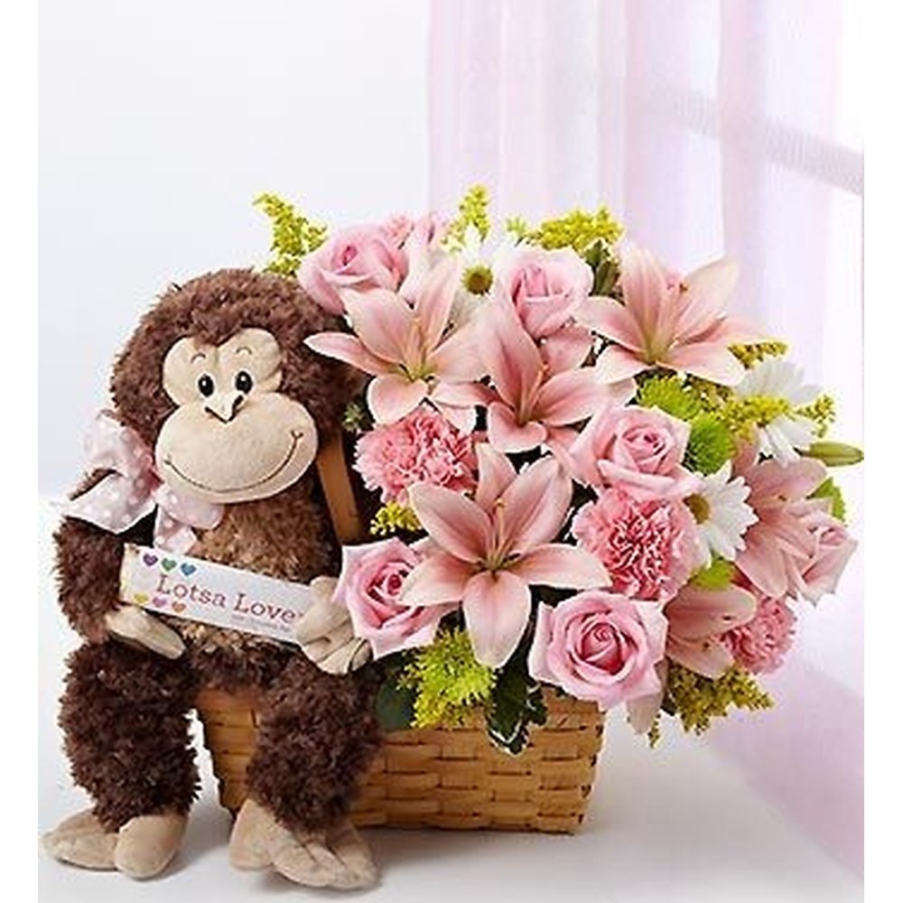 Monkey plush and pink lilies