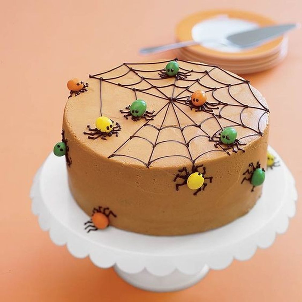 Halloween spiderweb cake with spiders