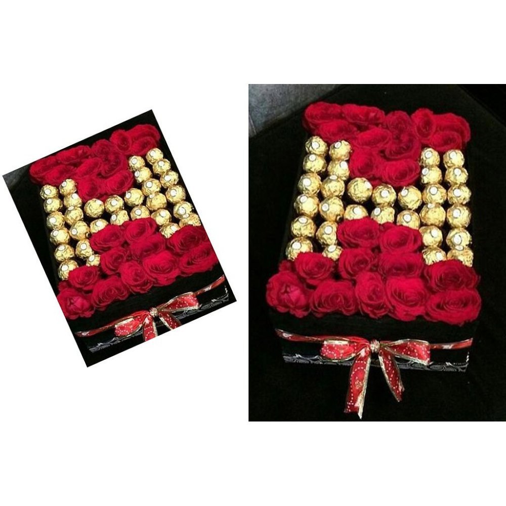Red roses and gold chocolates box