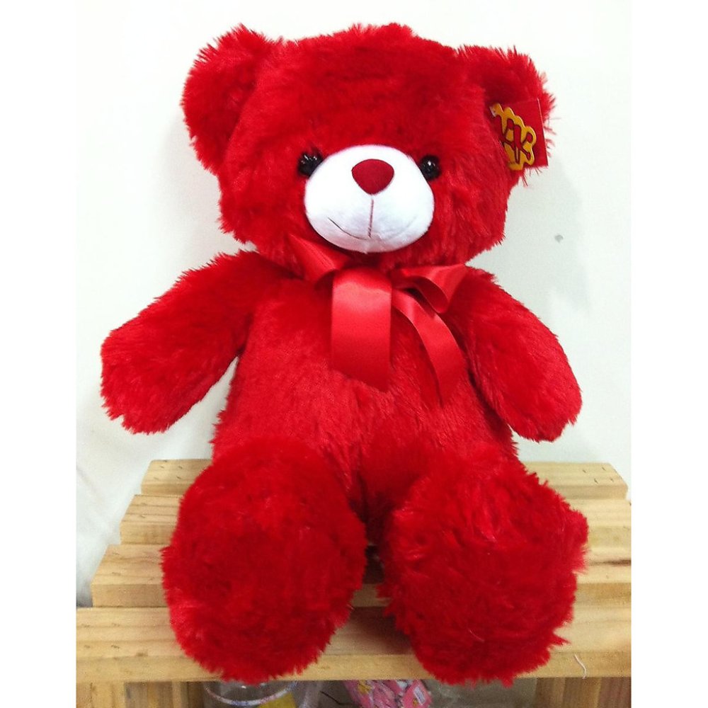 Red plush teddy bear bow