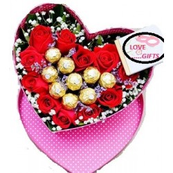 Valentine rose flower in box with chocolate