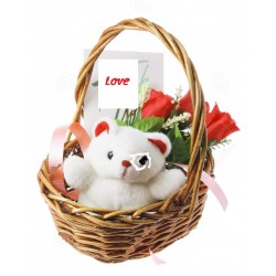 Valentine rose flower with teddy bear in basket