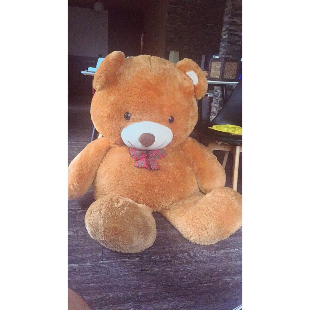Giant brown teddy bear plush