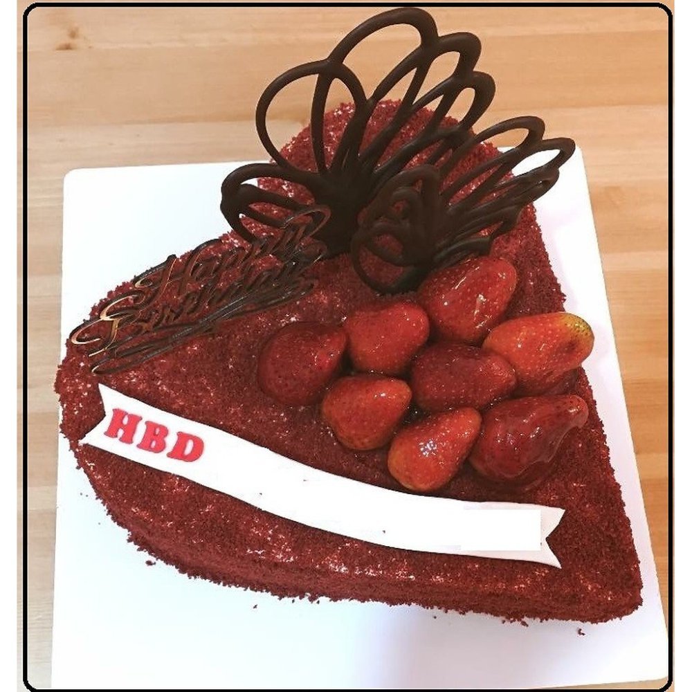 Heart-shaped red velvet birthday cake