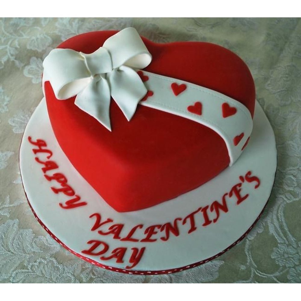 Pastel corazón rojo lazo blanco