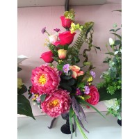 Plastic flowers in vase