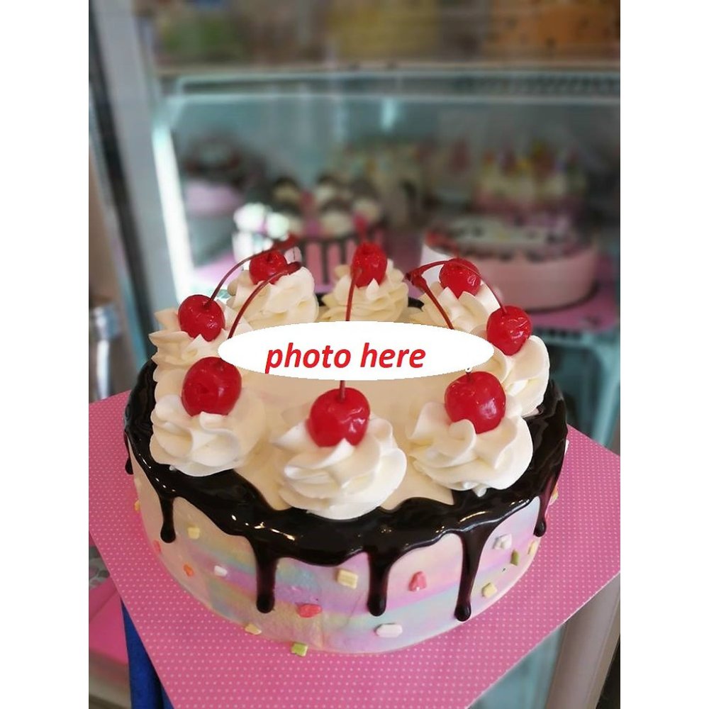 Chocolate drip cake with cherries