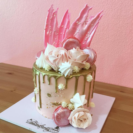 Pink gold drip macaron cake
