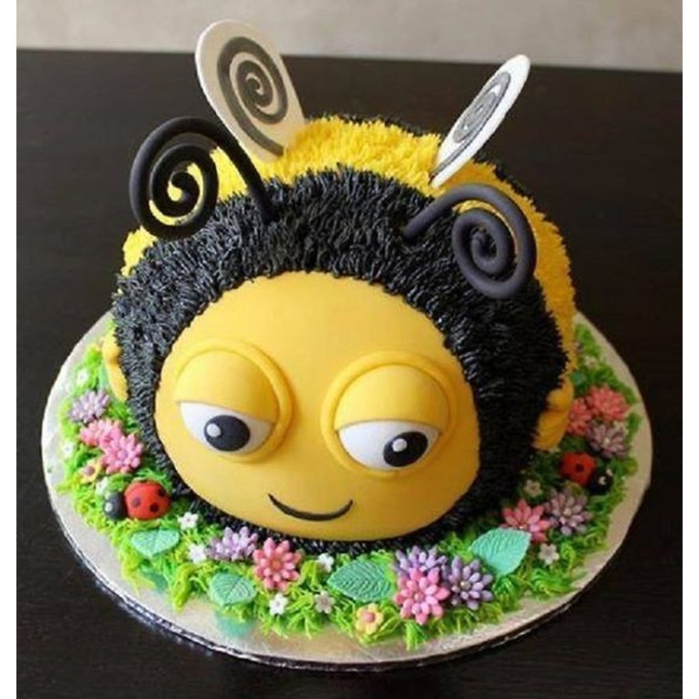 3D sculpted bumblebee character cake