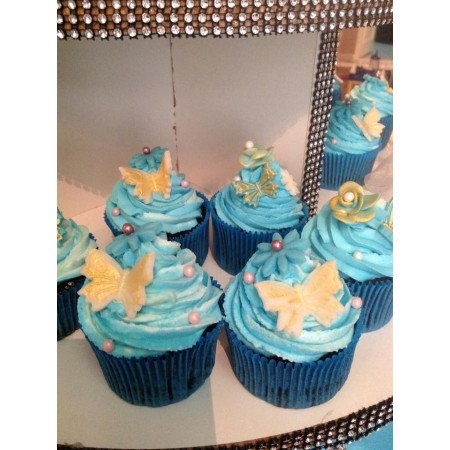  12‑Piece Decorative Cupcake Set with Blue Frosting, Sprinkles & Butterfly Toppers – Same‑Day Delivery Cakes - Foto 1