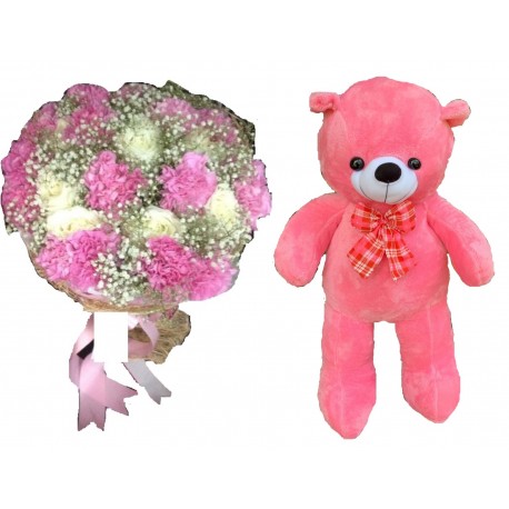 The  teddy bear size 1 meter with flowers