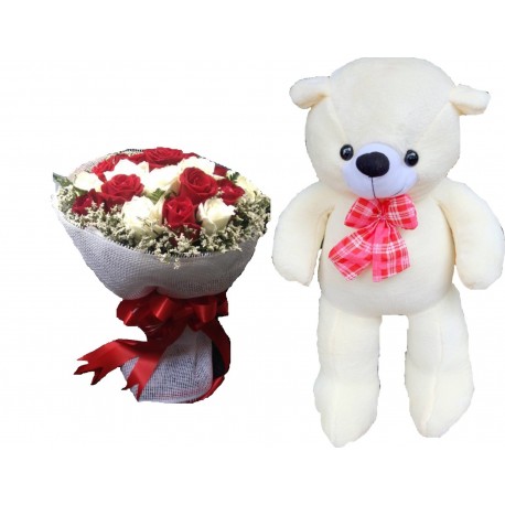 The  teddy bear size 1.20 meter with flowers (delivery in 2-3 day)