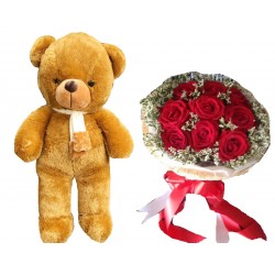 The  teddy bear size 1.20 meter and flowers
