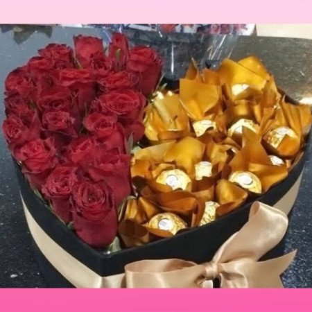 Chocolate with red roses flowers  in Valentine