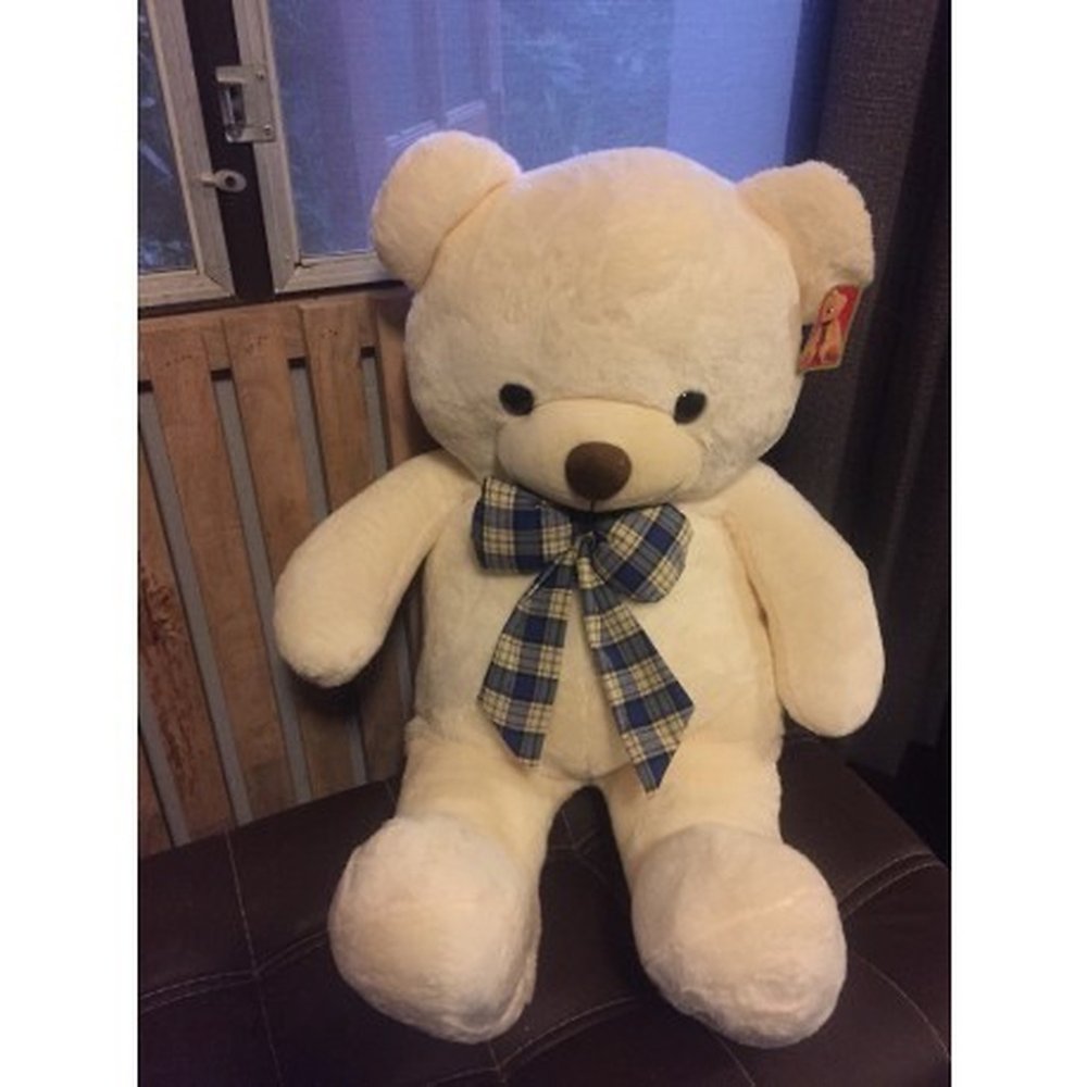 Large brown teddy bear plush