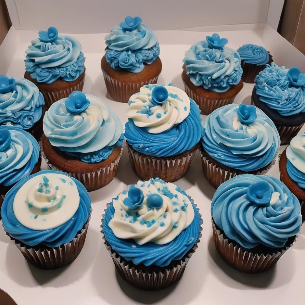 Assorted blue frosted gourmet cupcakes