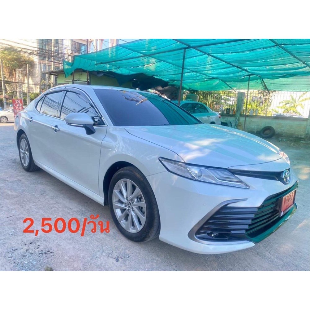 White Toyota Camry mid-size sedan