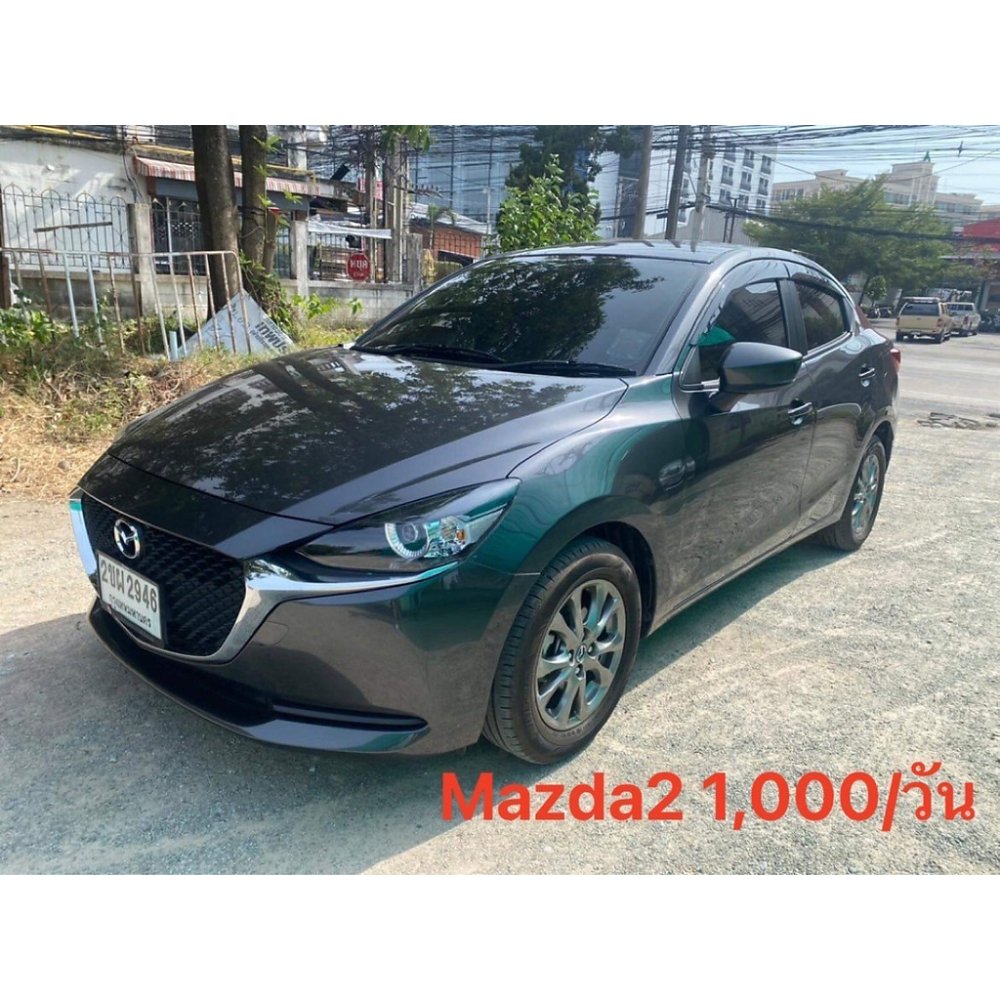 Grey Mazda 2 compact sedan