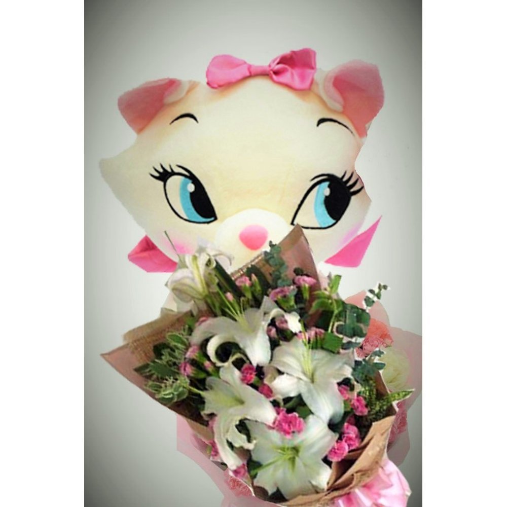 Lys blancs et chat en peluche