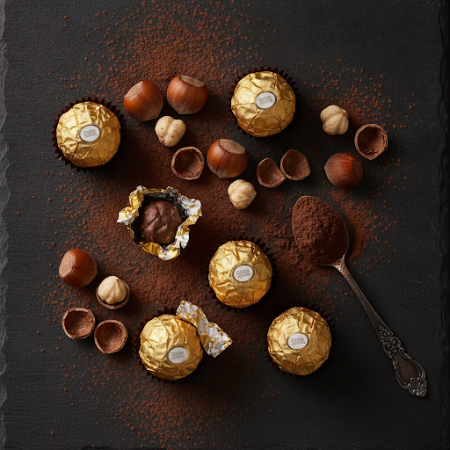 Gold wrapped hazelnut chocolate pralines