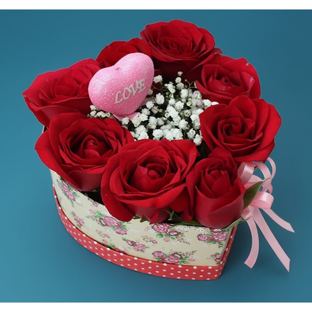 7 roses in box