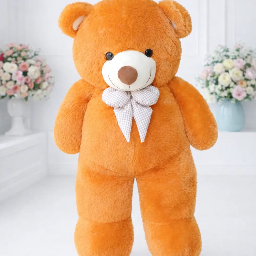 Giant golden-brown teddy bear plush