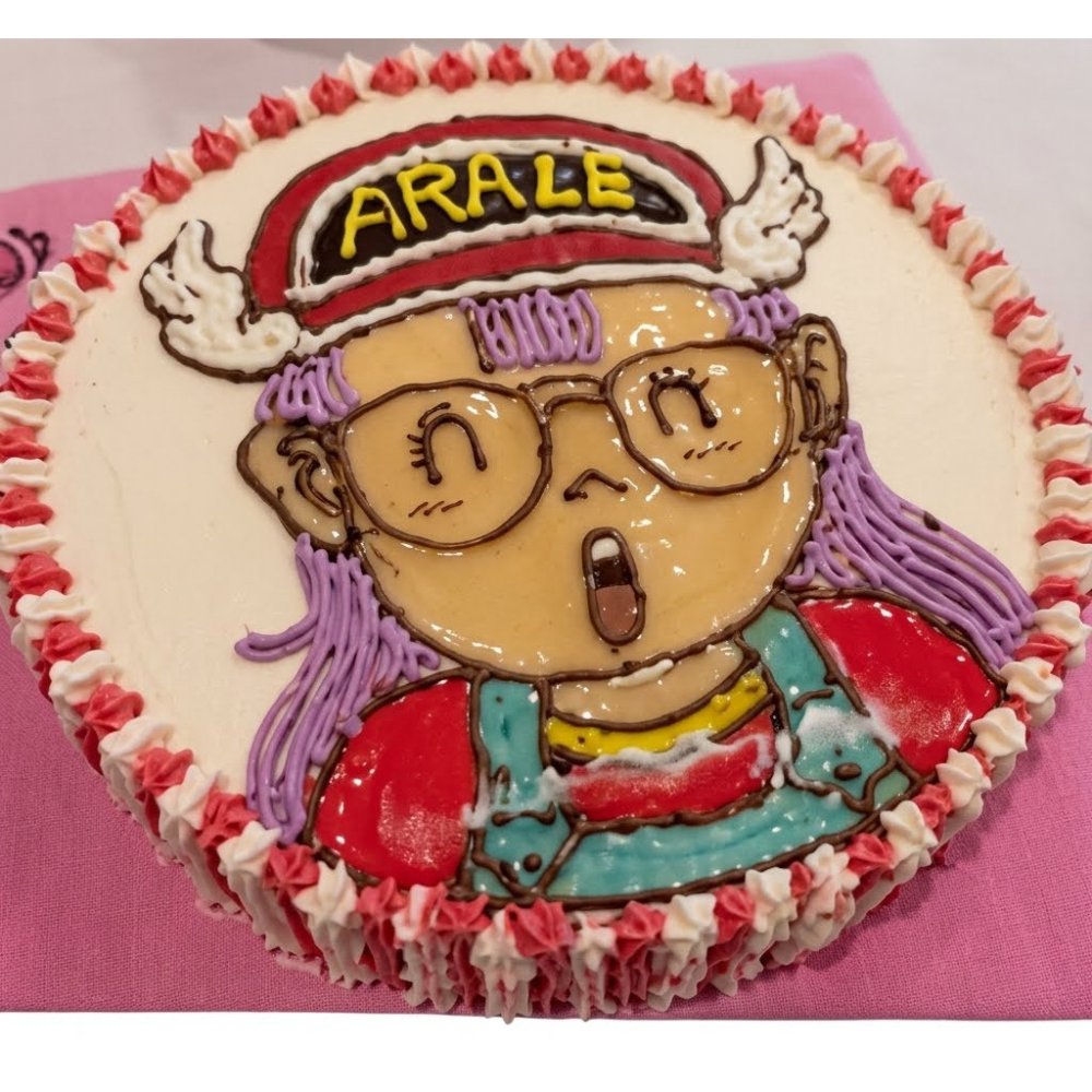 Arale character themed birthday cake
