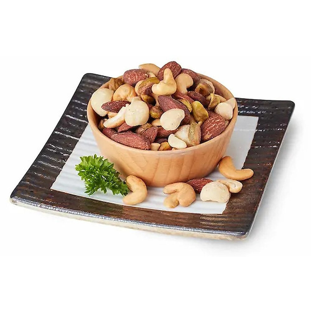 Mixed nuts in wooden bowl