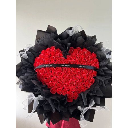 Heart shaped red preserved roses